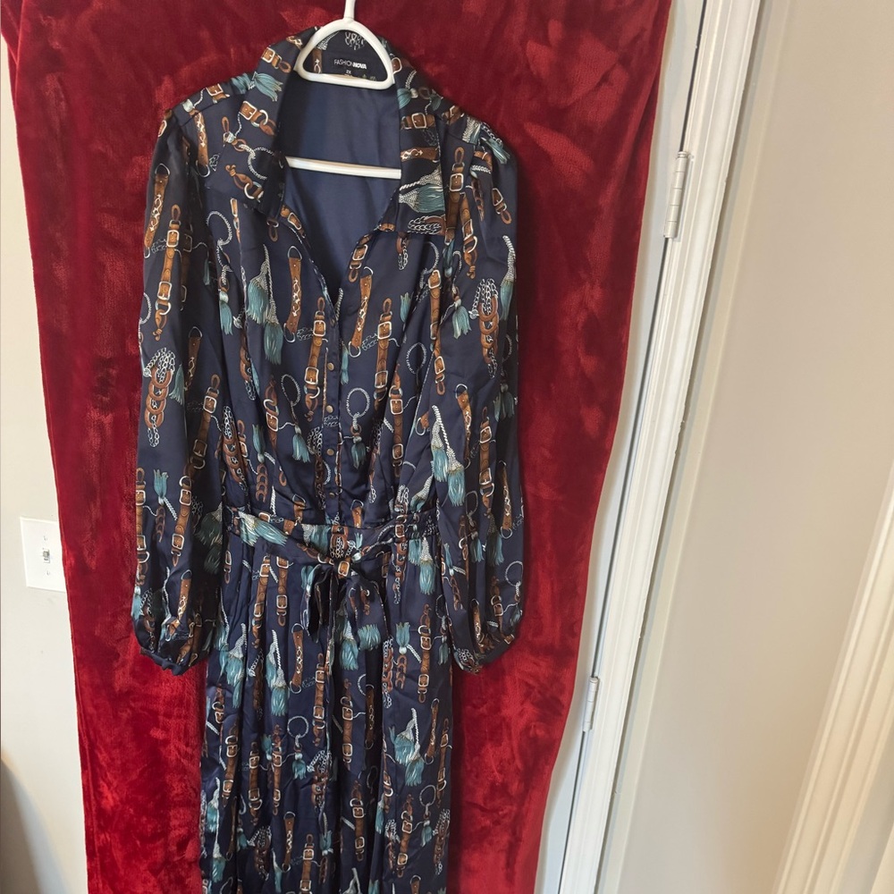 Women’s Navy Blue Belt Print wide legged jumpsuit.